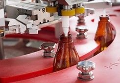 ガラス/プラスチックびんねじふた締め機機械