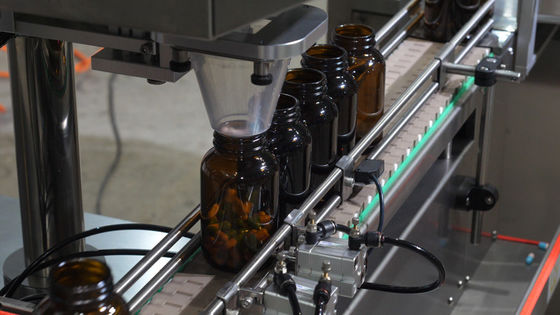 サーボ モーター丸薬詰物およびおおう機械